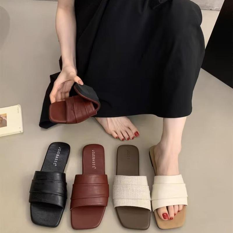 Folded soft leather slippers for women to wear summer soft flat-bottomed seaside vacation beach shoes one-word sandals