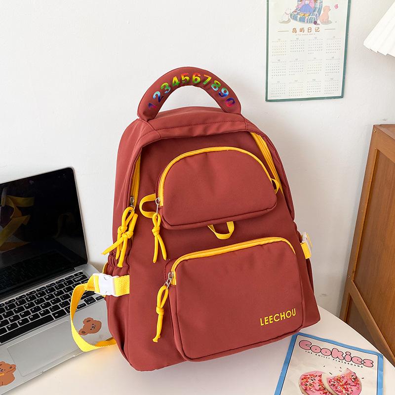 

School bag female student Korean version junior high school ins series small fresh and versatile contrasting color backpack nylon solid color backpack красный
