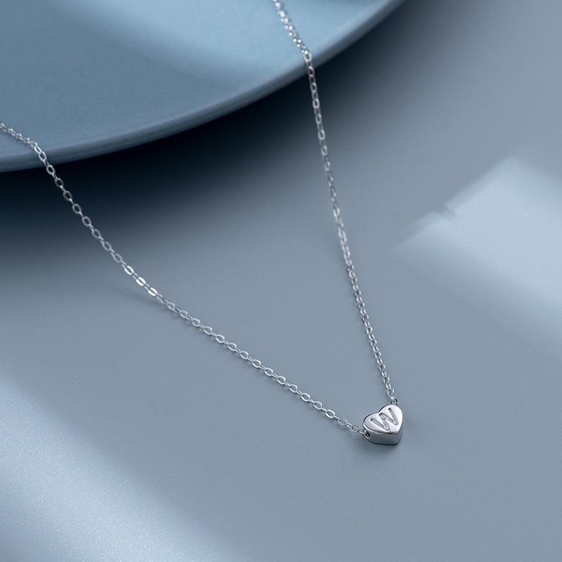 S925 Silver Heart-Shaped Initial Necklace - Korean Style Clavicle Chain with Trendy Peach Heart Design.