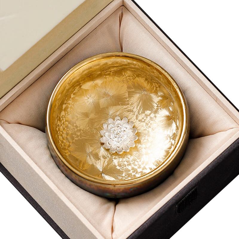 

Gilded Lotus Ceramic Teacup