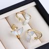 14K Gold-Plated Light Green Crystal Fishtail Adjustable Ring Holder.