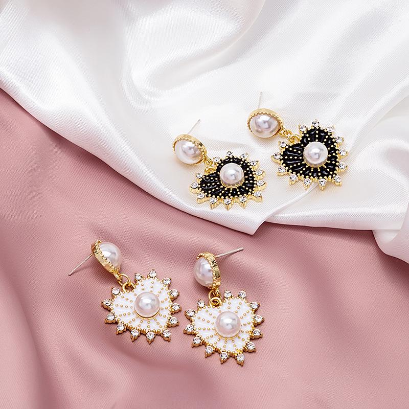 

Elegant Heart-Shaped Pearl Stud Earrings with Diamonds, Silver Needle, Black & White Tassel Design