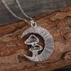 A stylish and cute red mushroom pendant necklace with a moon and a little girl design, suitable for women's everyday wear.