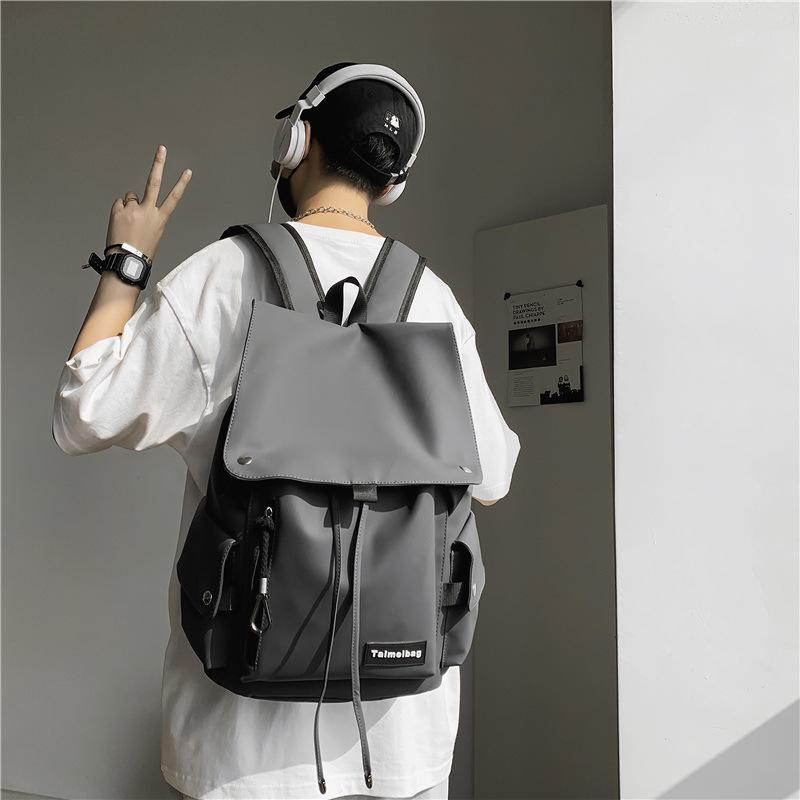 

Trendy and cool men s and women s backpacks, anti-splashing locomotive, large capacity, large cover, student schoolbag, new backpack. серый