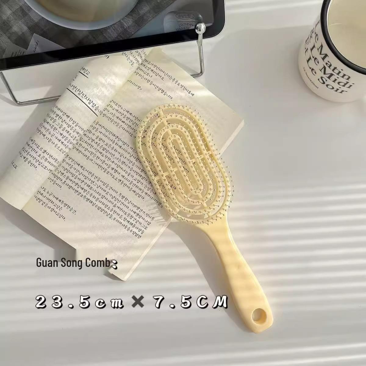 

Free Shipping: Large Curved Air Cushion Comb for Styling & Massage - Unisex