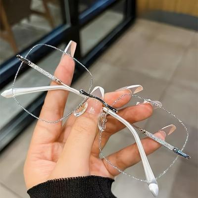 Gafas de mujer sin montura con diseño de cielo estrellado, lentes transparentes y montura brillante con forma de galaxia.