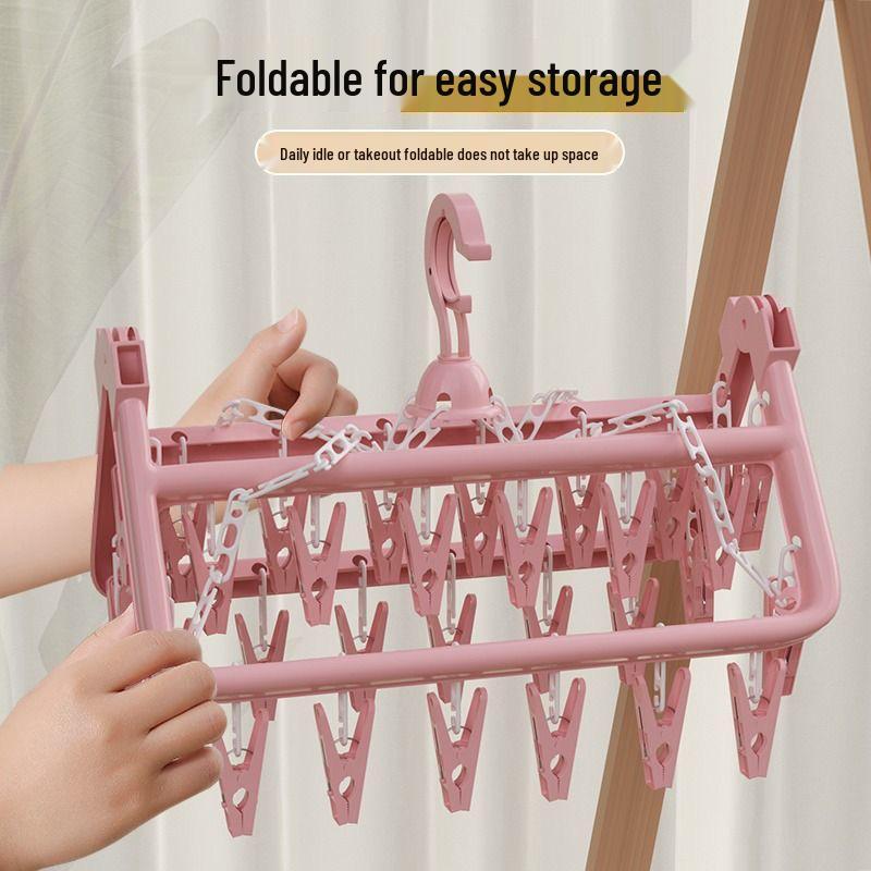 Retractable Indoor Multi-Clip Clothes Drying Rack for Socks, Underwear, and Travel.