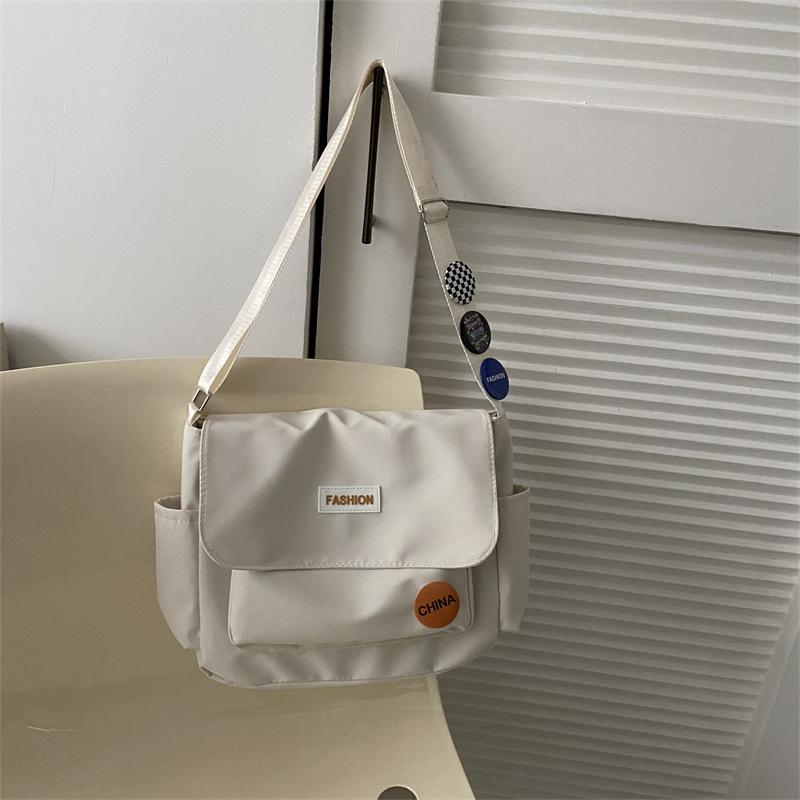 

Весняна нова нейлонова велика сумка для учнівського класу Сумка через плече на одне плече Модна і проста мила сумка через плече 35x10x25cm білий
