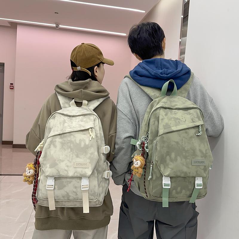New Korean version trend niche backpack male junior high school students solid color schoolbag female large capacity casual light backpack