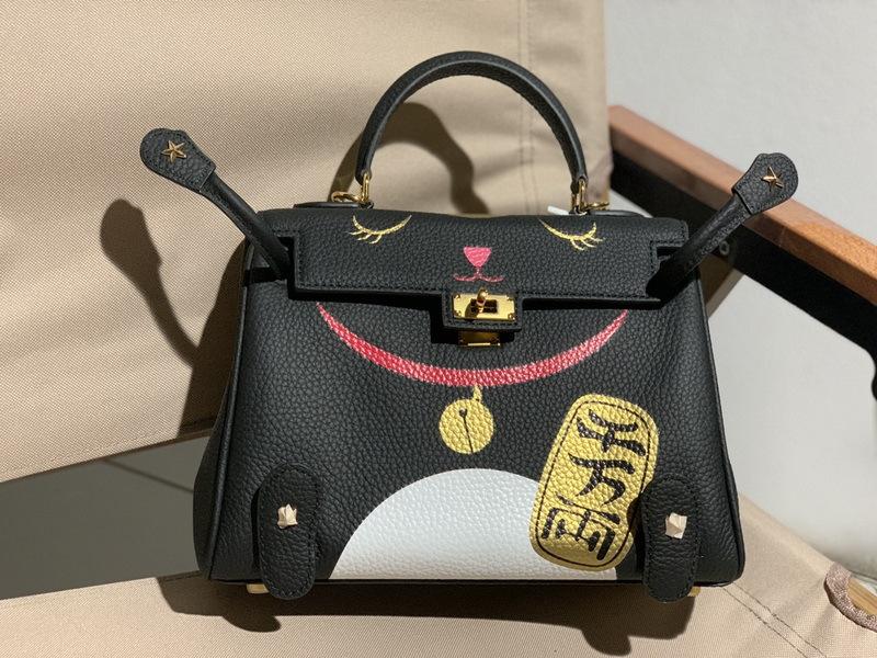 New Genuine Leather Women's Bag Head Layer Leather TOGO Leather Shattered Dimension Cartoon Graffiti Smiling Face Doll Women's Bag