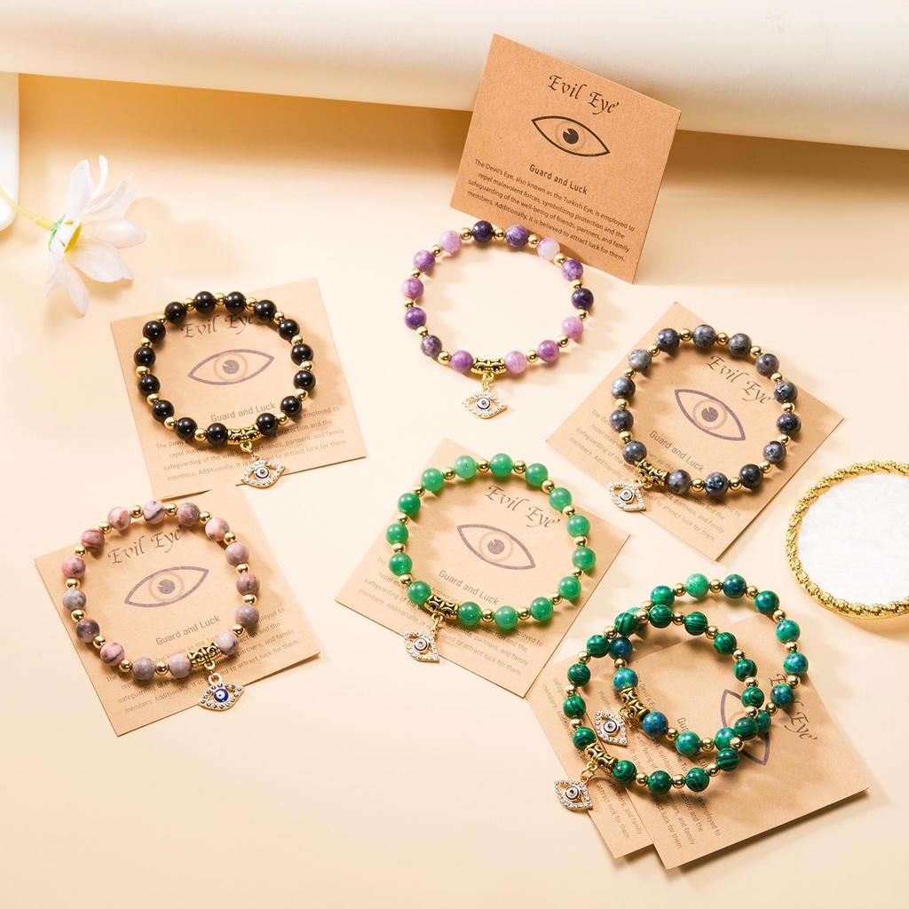 European-American Yoga Energy Bracelet with Natural Stone & Gold Spacer Beads, Featuring a Blue Evil Eye.