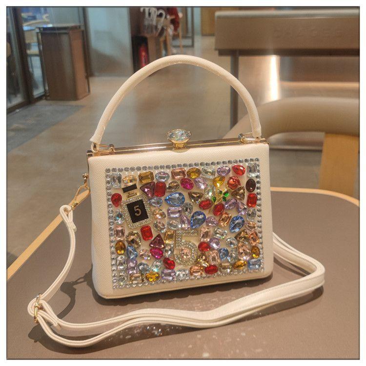 Light Luxury New Leather Fashionable Rhinestone Retro Clip Niche Handbag