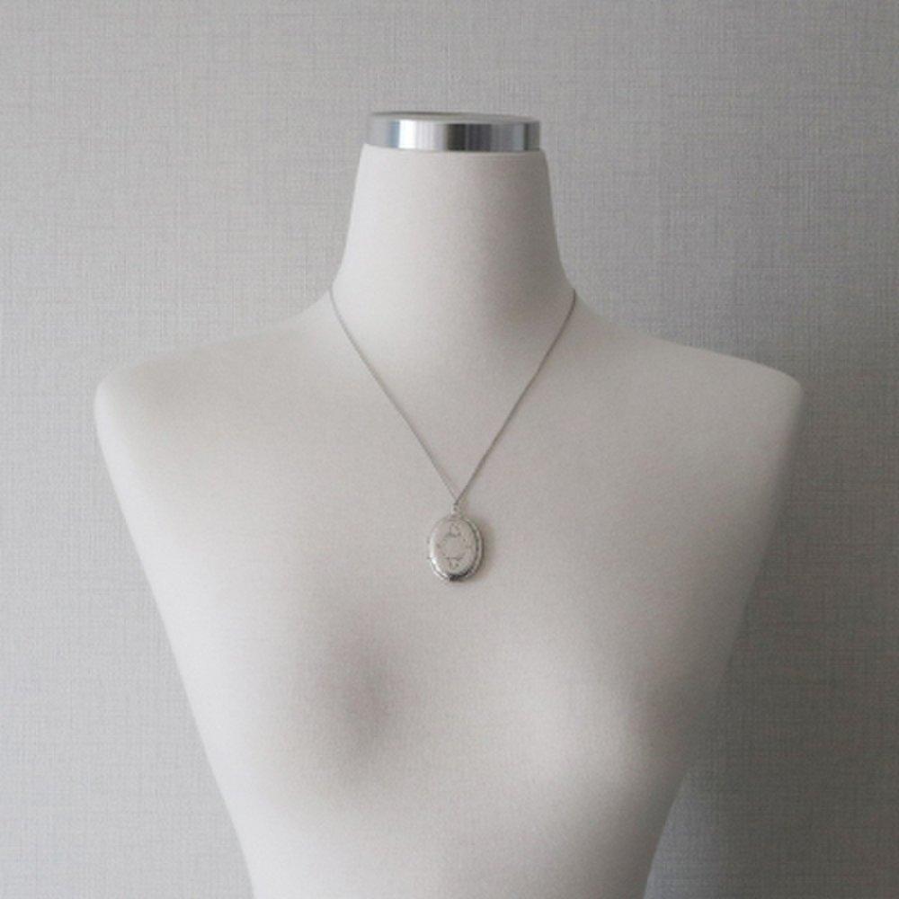 Silver round locket necklace with photo insert opening