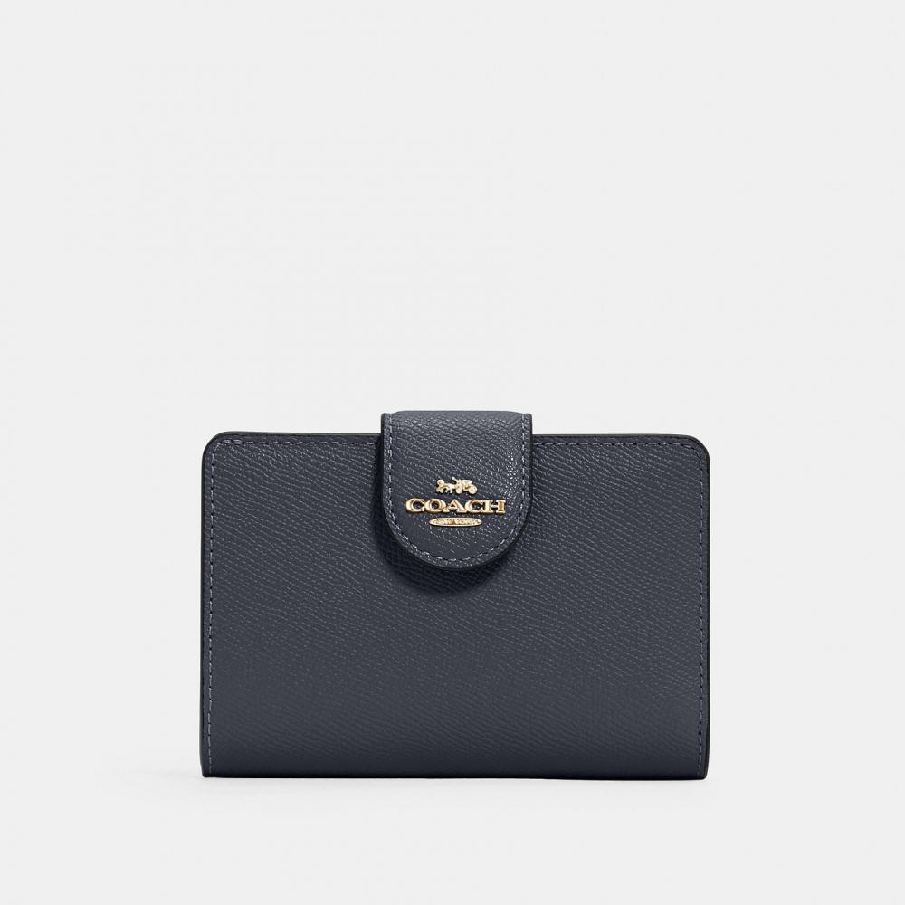 

Угловой кошелек Coach среднего размера на молнии