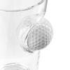 Glass with a Golf Ball Embedded In Its Wall