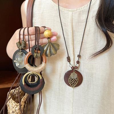 Bohemian Wood Beads Beaded Hollow Round Pendant Necklace Light Luxury High-end Sweater Chain Niche Necklace Accessories