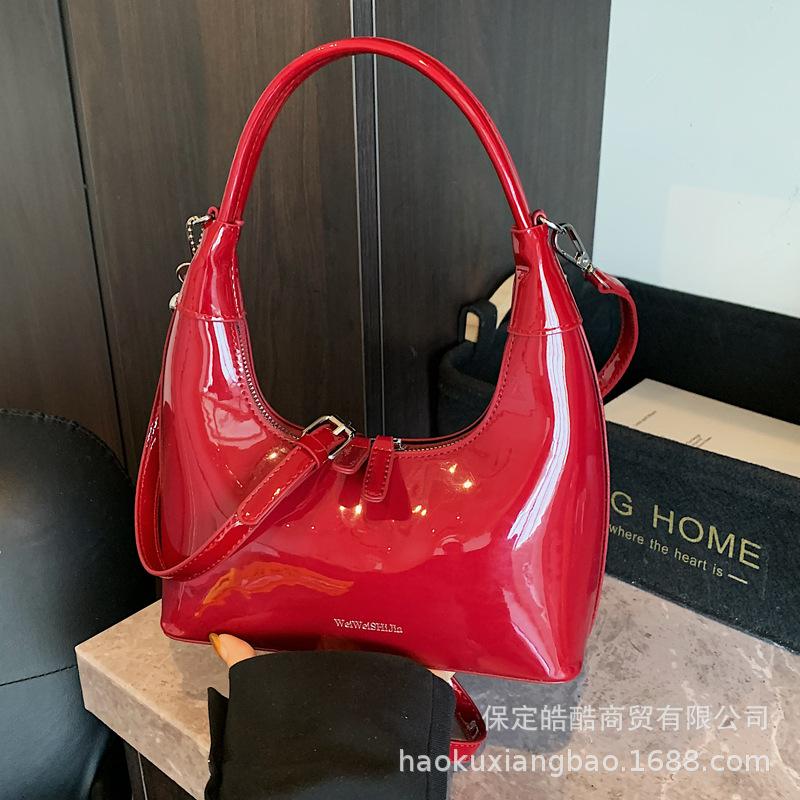 

Сумка премиум-класса нишевая женская лето 2025 новая модная на плечо, сумка-мессенджер, корейская версия, глянцевая портативная сумка-пельмень розовый