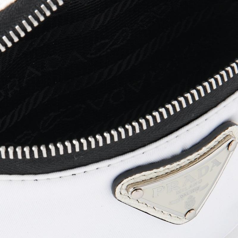 Prada Enamel metal triangle logo zipper closure fabric wrist bag mini women's white