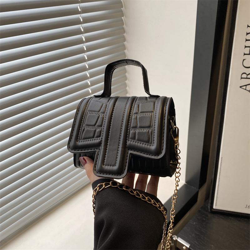 Neue Frühling- und Sommer-Mode einfarbige kleine quadratische Tasche Trend hohe Textur Mini tragbare Schulter-Umhängetasche Damen