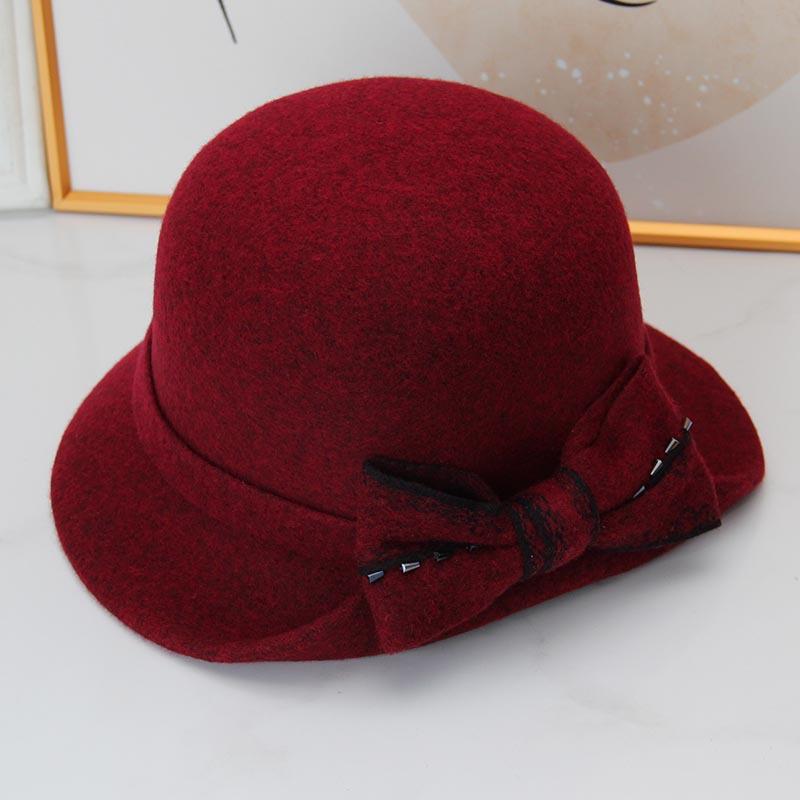 Autumn and winter hat women's thermal basin hat retro round top hat elegant bow fashion wool British fisherman hat