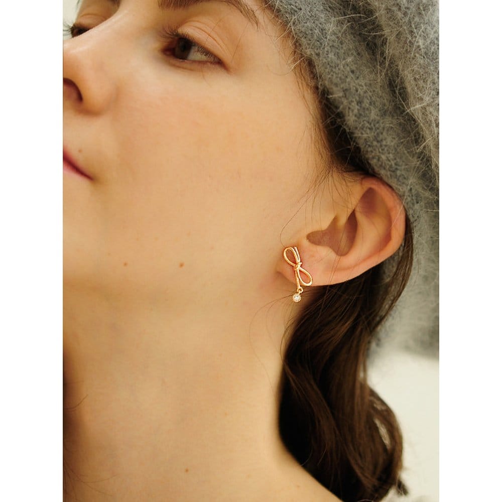 

Silver Riboni Earrings Yellow gold