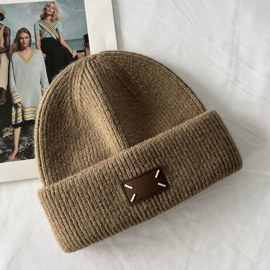 Winter new thick wool knitted hat warm versatile bag head hat flanged ear protection fashion wool hat women's cold hat