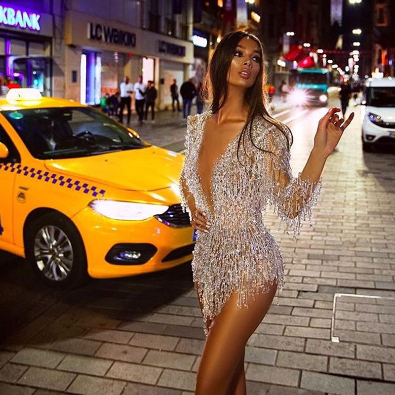 2026 spring and summer European and American cross-border new women's clothing wish dress sexy perspective sequins fringed deep V miniskirt