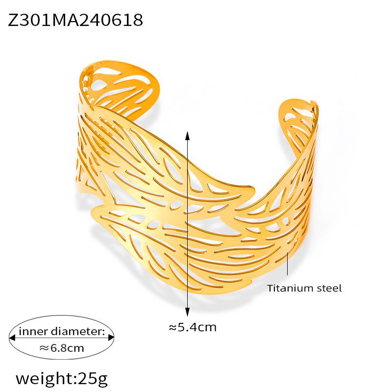 

Европейский и американский нерегулярный браслет-манжета с листьями - Шикарный дизайн из титановой стали.