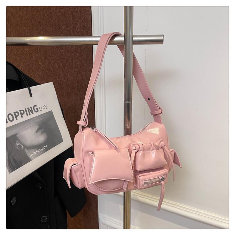 

Retro personalized locomotive style casual messenger bag bag fashion niche high-end texture retro oil wax pitot women s bag розовый