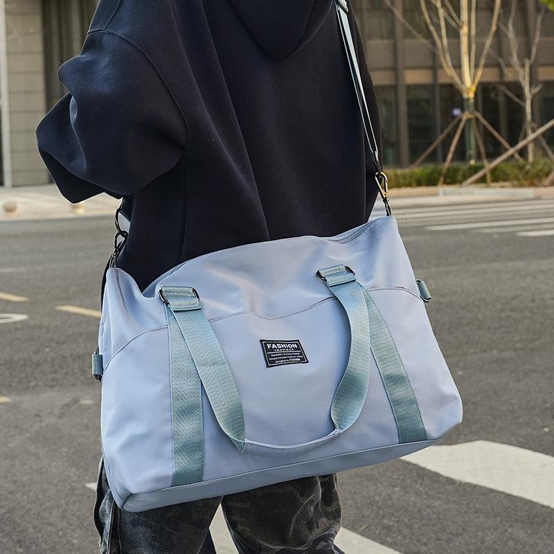 Men and Women Same Style Multi-pocket Travel Lightweight Storage Handheld Travel Bag Sports Gym Bag Can Be Used To Pull Rod