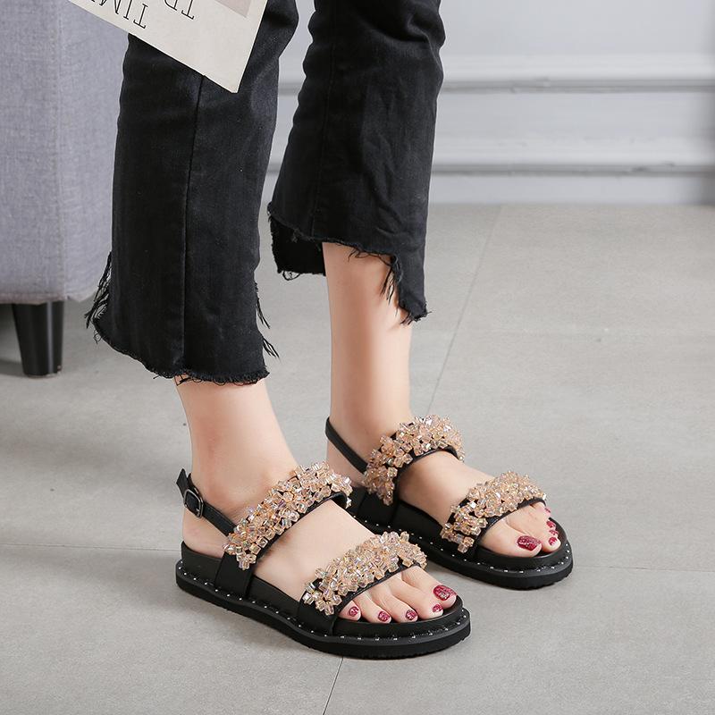 2025 Sommer neue Zehenfreie Dicksohlige Ein-Wort-Schnallen-Sandalen Damen Koreanische Version Vielseitige Lässige Flachboden-Strand-Römersandalen