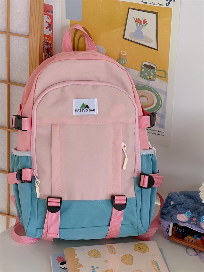 

New contrasting color casual backpack large capacity personalized campus style junior high school student backpack