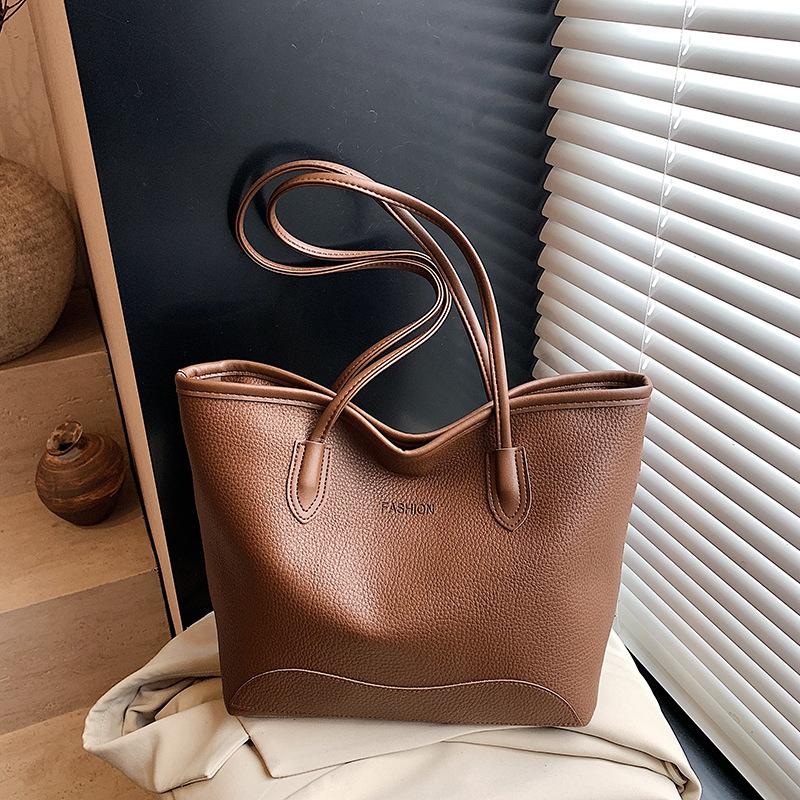 Popular retro bag women's large capacity 2025 new spring casual messenger bag portable bucket bag