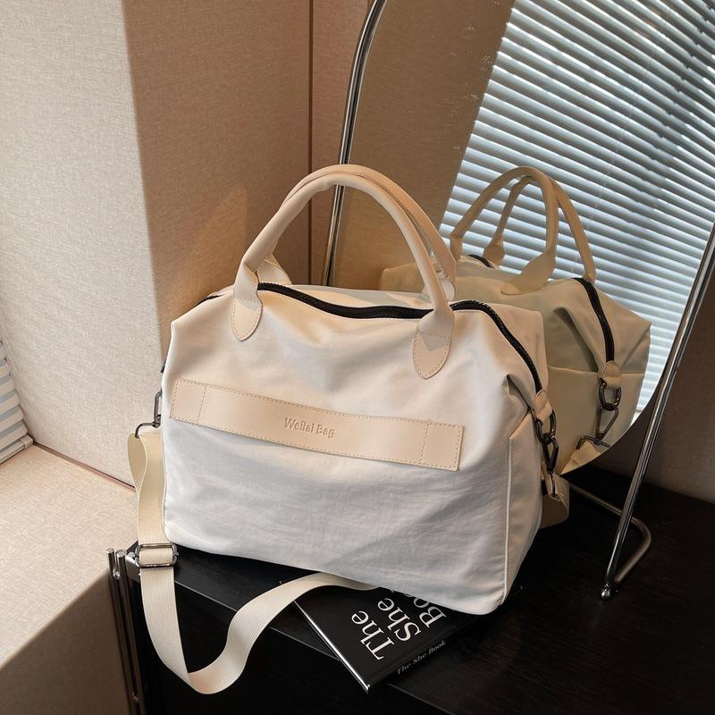 Travel bag Women's lightweight portable large-capacity short-distance travel bag Student luggage bag Waterproof sports storage bag Travel bag