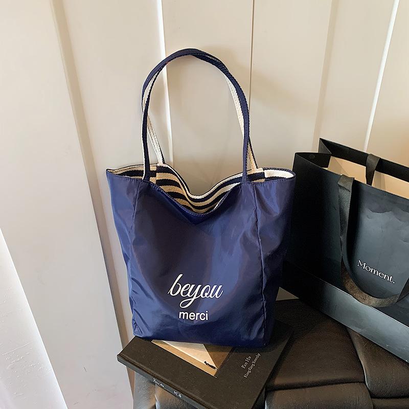 Lazy wind striped canvas bag women's 2025 new commuter double-sided tote bag red fashion casual shoulder bag