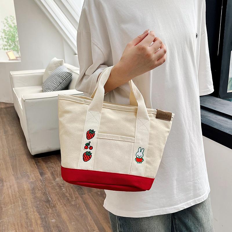 Splicing contrasting color portable canvas bag, handbag for work, cute meal bag, cartoon casual handbag.