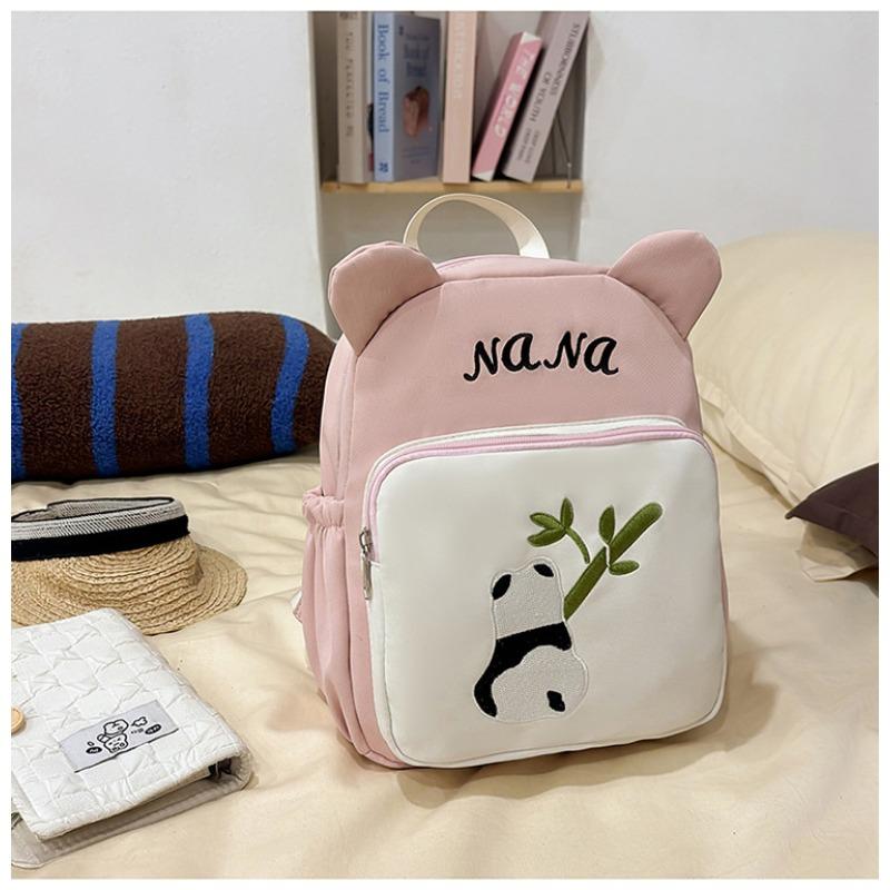 The new schoolbag is high-value, fresh, sweet and cute, red panda backpack, kindergarten level 1-3 large-capacity backpack.