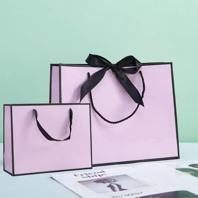 White Paper Jam Handbag Kraft Paper Thick Waterproof Frame Rivet Handle Gift Bag Cosmetic Clothing Store Portable Packaging Bags