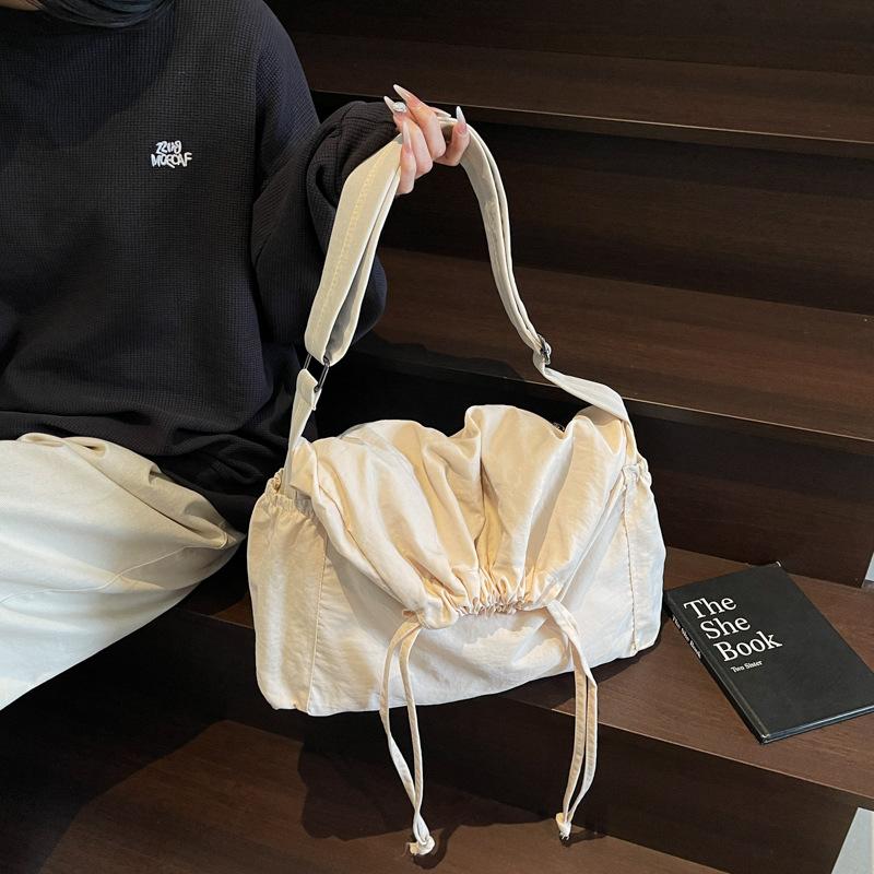Large capacity drawstring nylon canvas bag women's new fashion bucket bag casual solid color shoulder messenger bag