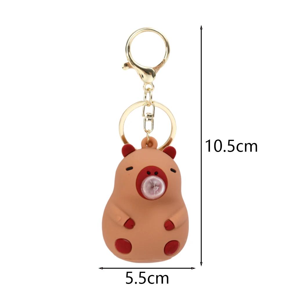 

Capybara Pinch Music Toy Blowing Bubble Keychain Girls Capybara Doll Decompression Toys Children s Schoolbag Pendant коричневий