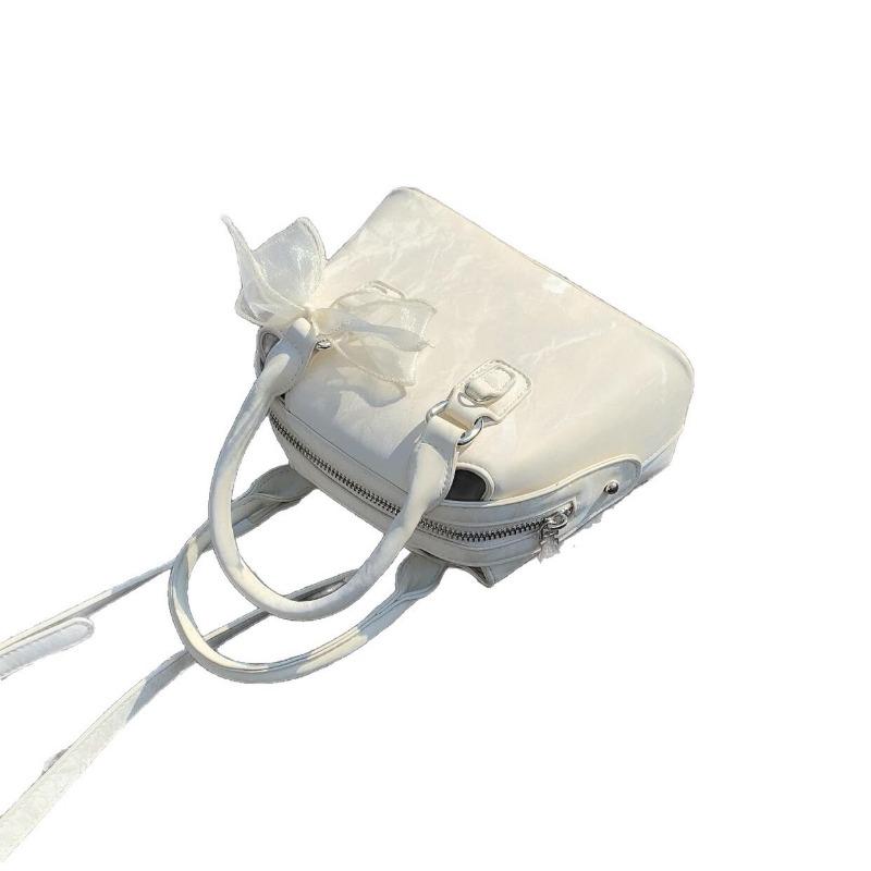 Lace Bow Boston Bag, A Textured and Fashionable Crossbody Bag, A Commuter Shell Bag