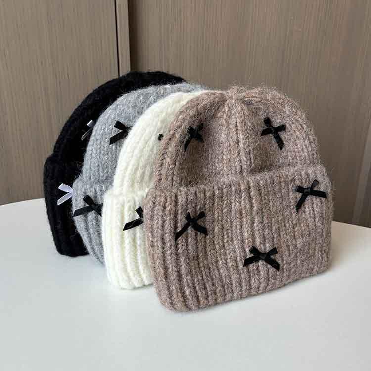 Wool hat women's autumn and winter new bow knitted hat shows a small face, warm ears, bag head, all-match cold hat