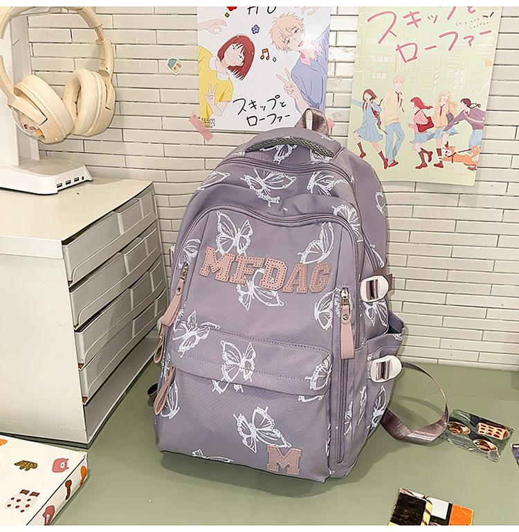 Schoolbag Soft light Cool atmosphere Milk white butterfly full print schoolbag Junior high school students Daily commute Lightweight versatile