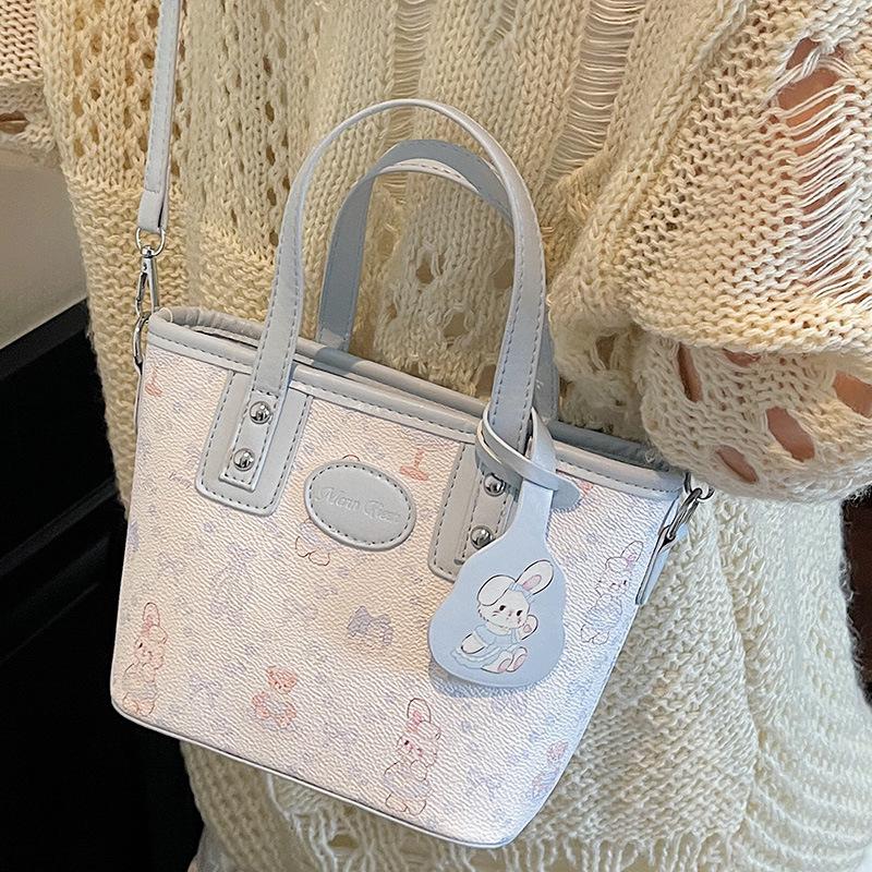 Textured Foreign Gas Bucket Bag Women's 2025 New Cartoon Printed Portable Shoulder Bag Fashionable Splicing Commuter Messenger Bag