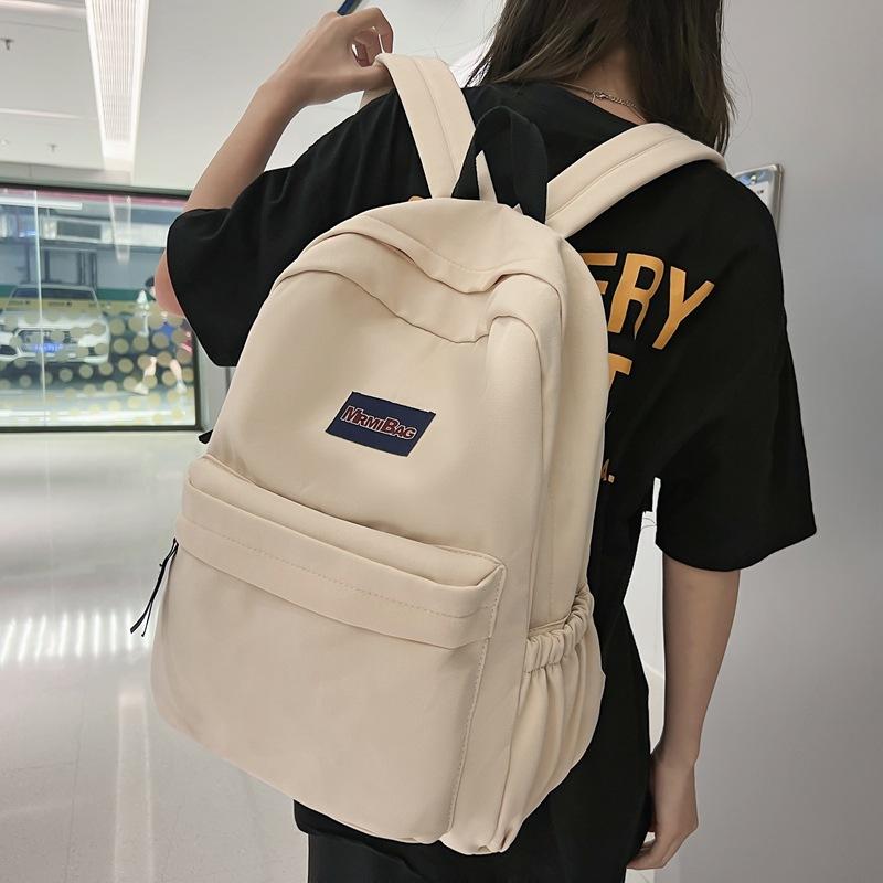 Zaino alla moda Zaino da scuola per donna 1011 Nuovo Zaino per studente di scuola media Stile College Zaino scolastico Edizione coreana Moda Colore solido Zaino da viaggio