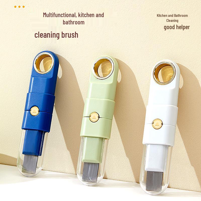 Four-in-One Kitchen Cleaning Tool: Multifunctional Brush, Stove Shovel, Steel Wire Crevice Brush, and Pot Lid Faucet Cleaner.