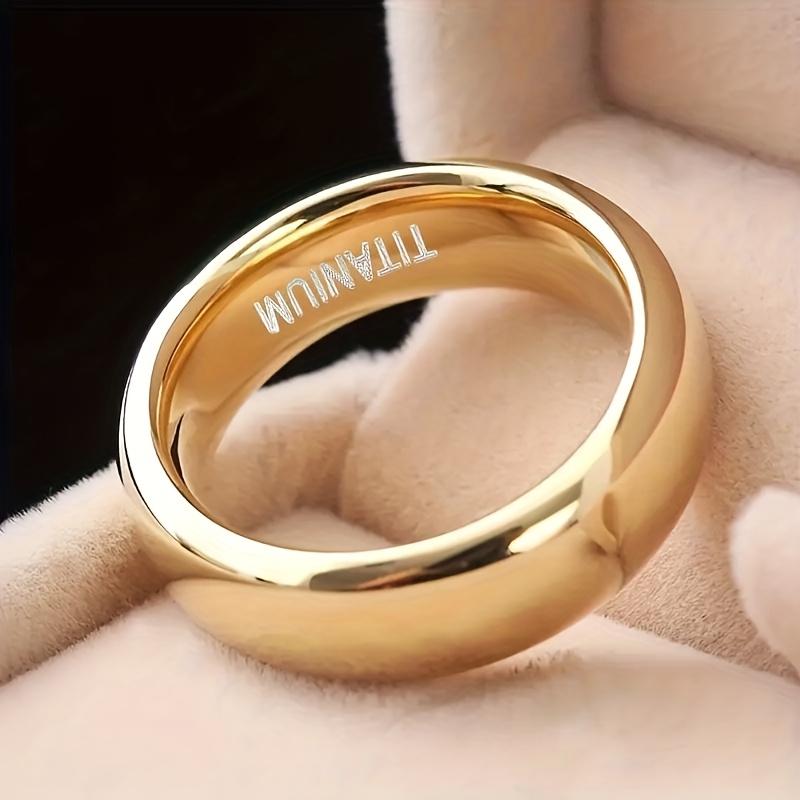 Ring in a Golden Gloss End, Featuring a Modern Minimalist Design Suitable for Weddings And Everyday Use. Showcasing a Stylish Polished Surface