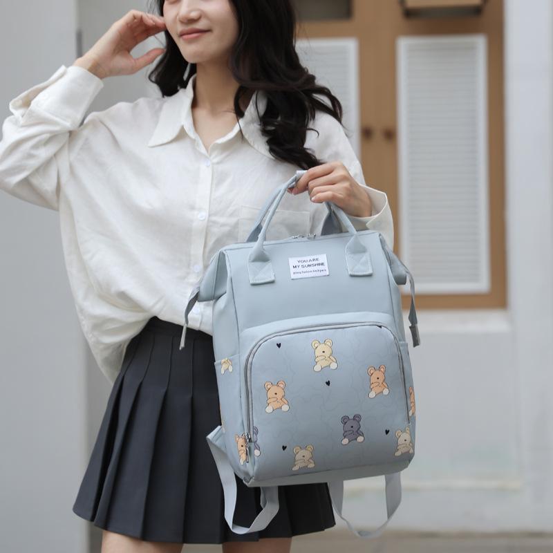 New printed mommy bag, multi-functional backpack, fashionable and cute mother and baby bag, mother bag, portable diaper bag.