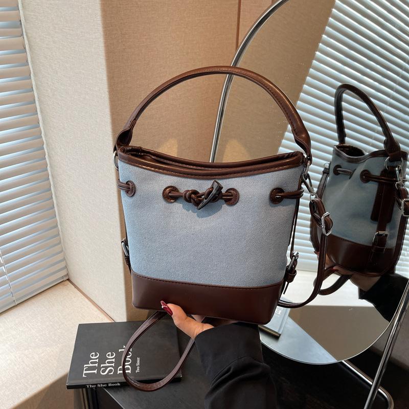 Premium sense simple retro bucket bag women's 2025 summer new messenger bag casual portable shoulder bag