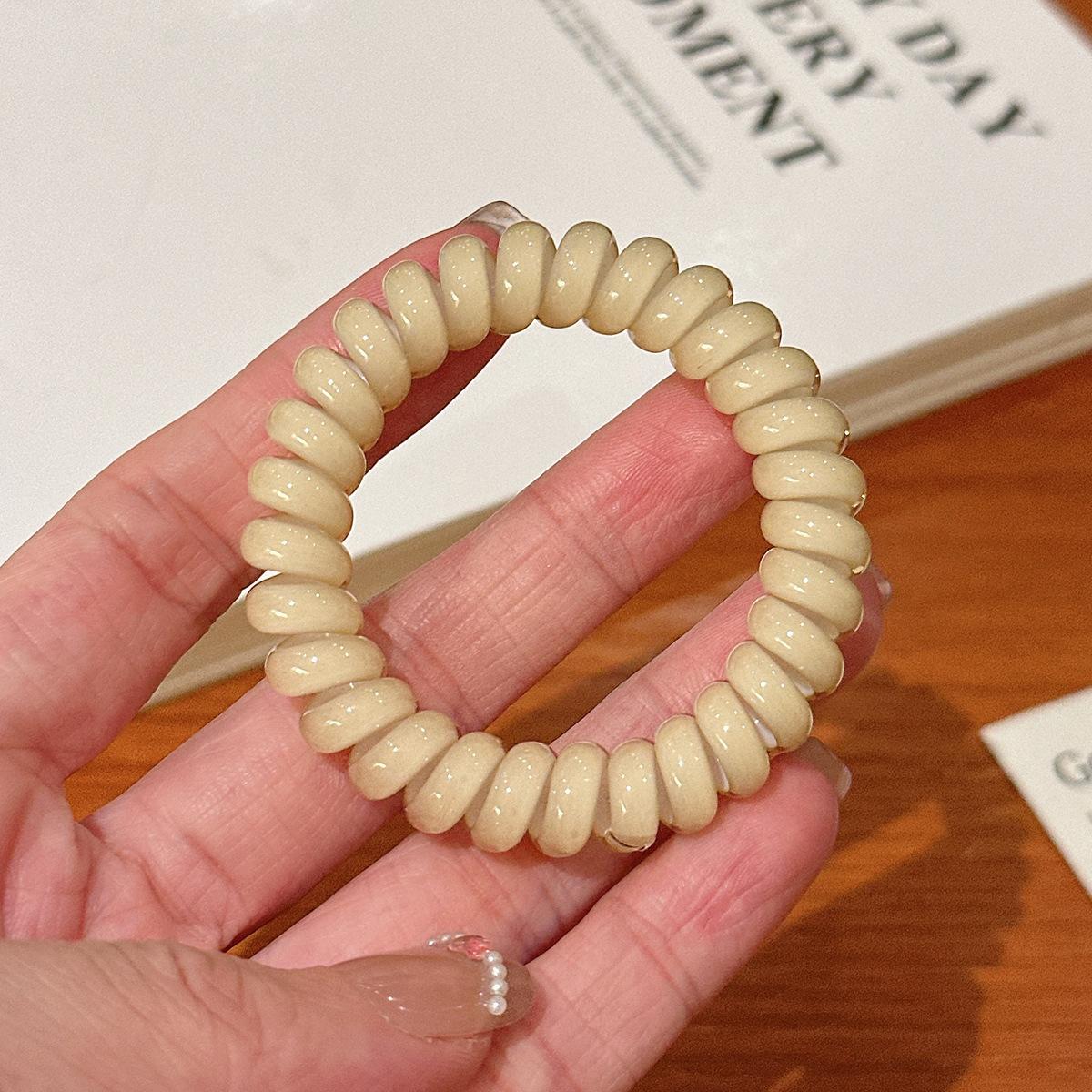 

Candy-colored Telephone Cord Hairpin for Women with High Elasticity and Durability for Tying Hair. No Trace on The Head. Simple Design. 4pcs